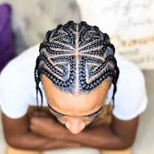 Top view of a men's cornrow design with curved, patterned parting braided at Ani Braids in Lanham, Maryland