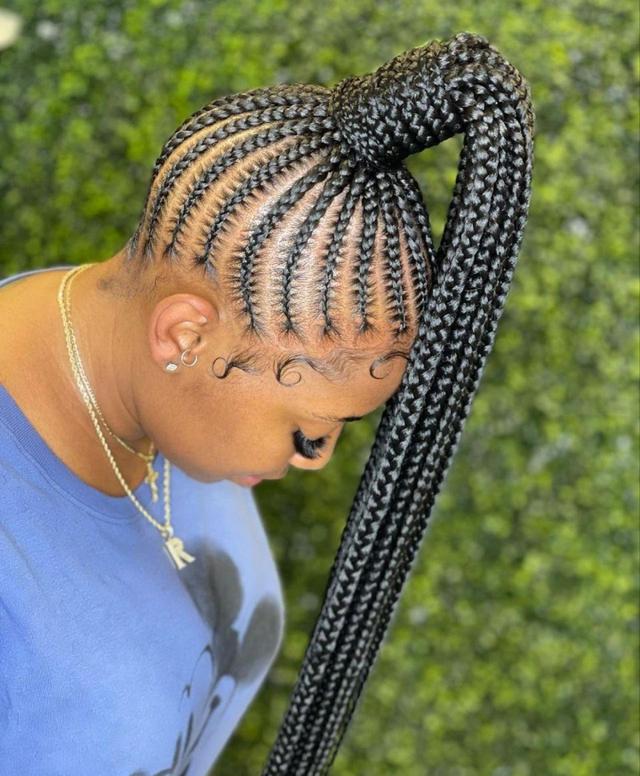 Black cornrow braids styled into a long, high ponytail by Ani Braids in Lanham, Maryland