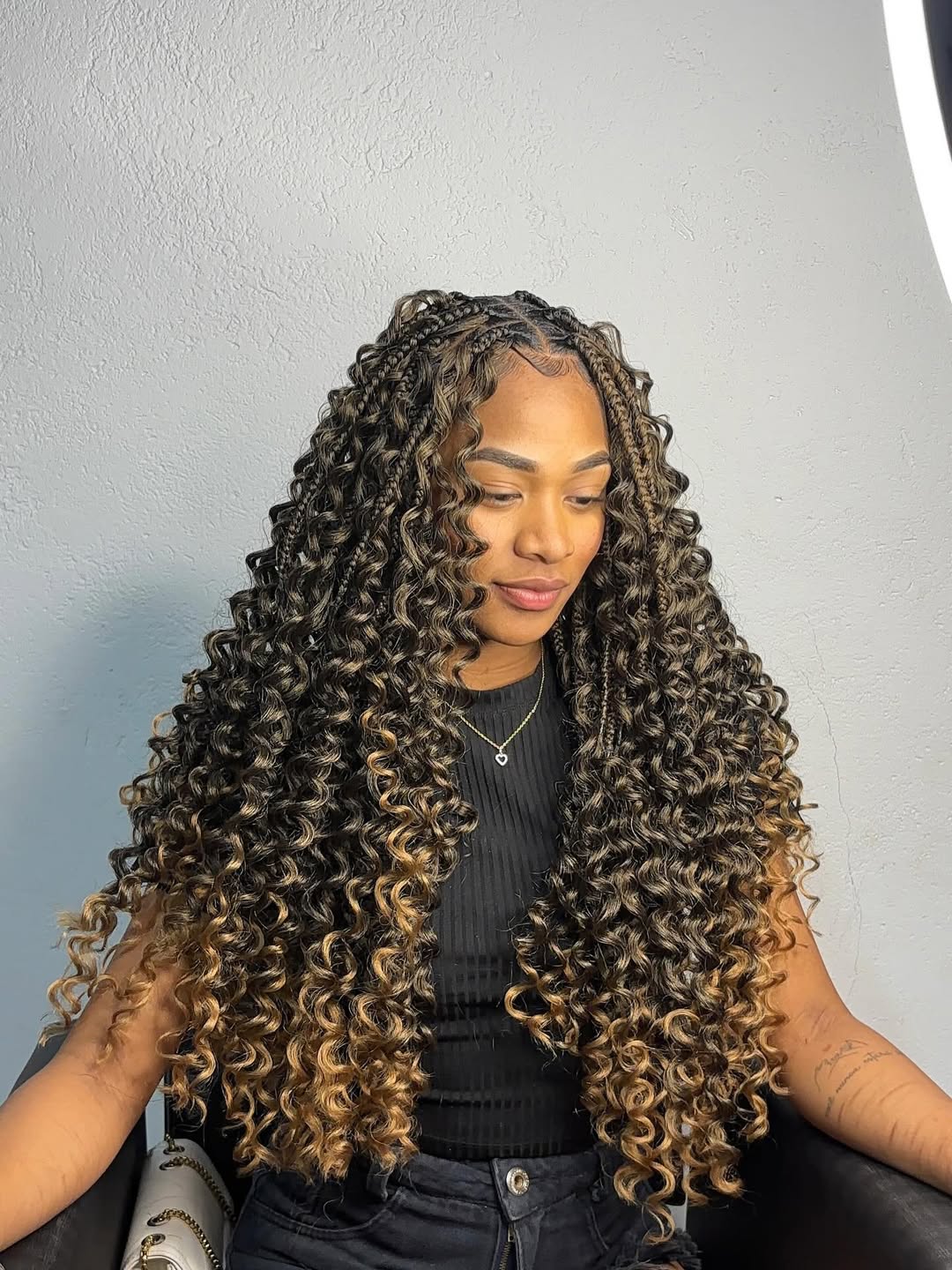 Long goddess boho crochet braids in brown to blonde ombre by Ani Braids in Lanham, Maryland